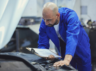 Mechanic, inspection or man with checklist in service store or garace for transportation industry....