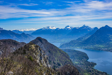 Wonderful views on a walk above the picturesque Lake Annecy. Route along the ridge from Mont Veyrier to Mont Baron from Annecy. Annecy, Haute-Savoie, France.