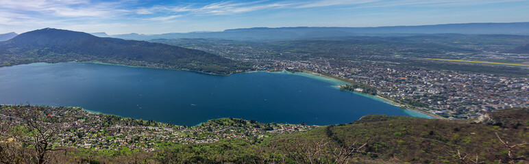 Wonderful views on a walk above the picturesque Lake Annecy. Route along the ridge from Mont Veyrier to Mont Baron from Annecy. Annecy, Haute-Savoie, France.