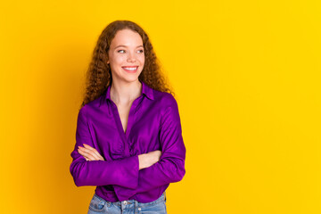 Photo portrait of lovely young lady crossed hands look empty space dressed stylish violet garment...