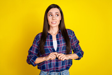 Photo portrait of attractive young woman look shy nervous empty space dressed stylish plaid clothes...