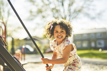 Happy kid on playground on summer season