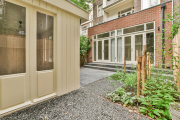 Cozy backyard with modern extension and greenery