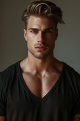 Naklejka premium A man with tattoos and a black shirt.