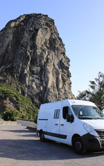 A beautiful holiday camper parked next to Roque Agando on the island of La Gomera (Canary Islands)