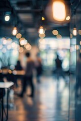 A blurry image of a restaurant with people walking around. Scene is busy and lively, with people going about their day