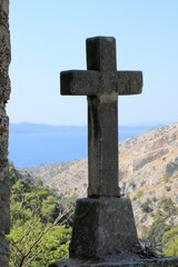 stone cross in the Blaca Monastery, island Brac, Croatia