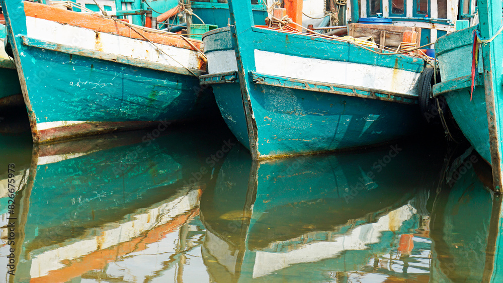 Poster colorful fisher boats in a harbor in kampot