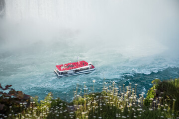 Fototapeta premium Tourist boat on Niagara Falls. Ontario, Canada.