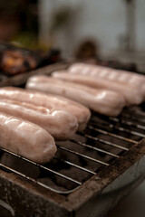 Sausages being grilled on a BBQ