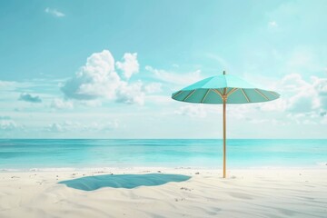 A blue umbrella is on a beach next to the ocean. The sky is blue and there are clouds in the background. The scene is peaceful and relaxing