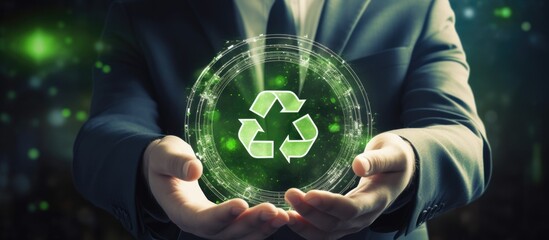 Businessman hold circular economy icon. Sustainable strategy approach to eliminate waste and pollution for future growth of business and environment, design to reuse and renewable material resources
