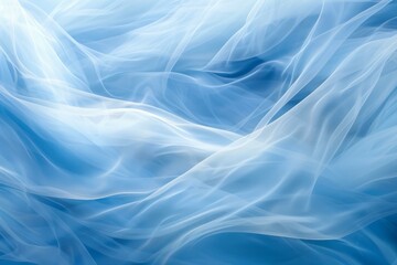 Elegant waves of blue silk fabric creating a smooth, flowing texture