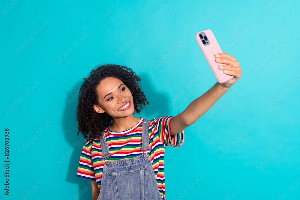 Sticker photo of positive girl make selfie on gadget isolated blue color background