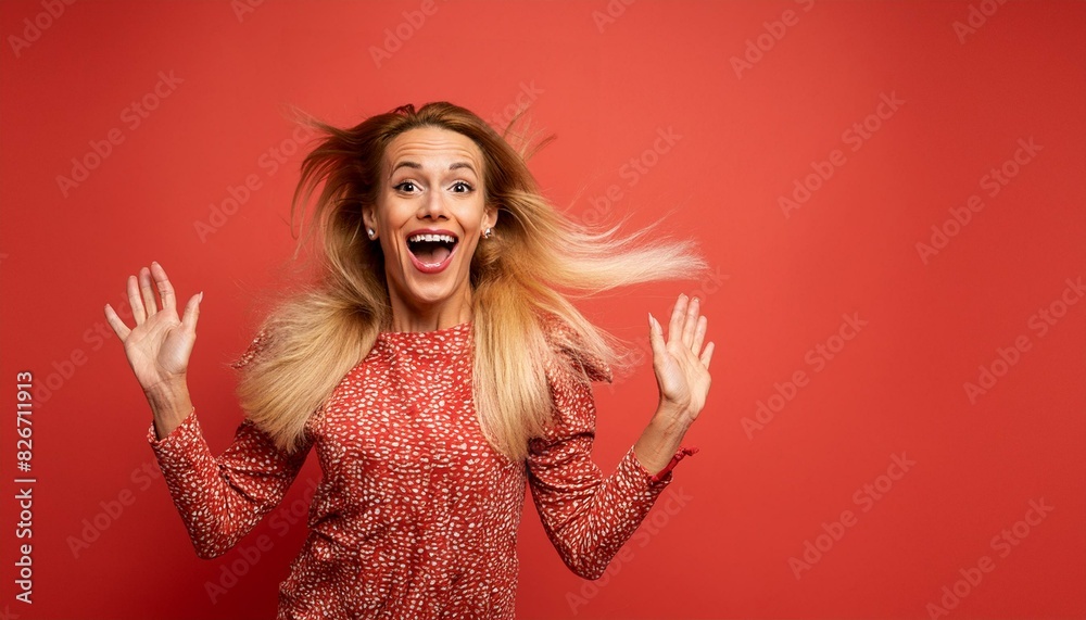 Wall mural pure joy in every leap of a person on red background