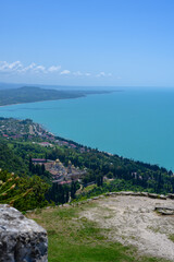 New Athos, Abkhazia, Georgia - July 04, 2022: Ruins of Anacopia Fortress at the top of the Iverian...