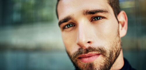Portrait, man and face with sunlight for good feeling, mockup and natural in outdoors. Male person,...