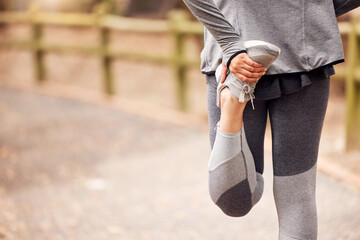 Woman, legs and stretching closeup on road for fitness, exercise and wellness with walk at park in...