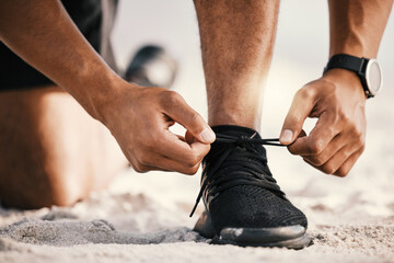 Runner, hands and tying shoes in outdoor for cardio, workout, endurance training or marathon...