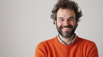 Fototapeta premium Happy and Confident Man in Sweater on White Background