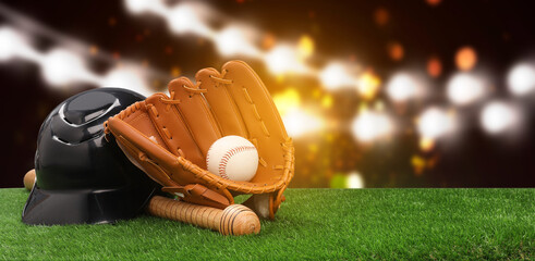 Baseball bat, glove, helmet and ball on grass at stadium. Banner design with space for text