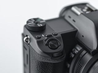 Professional photo camera, close-up view, isolated on white background