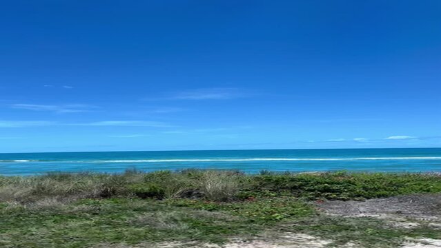 Driving along Highway A1A the beach near Flagler Beach, Florida.