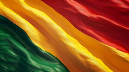 Fototapeta premium A beautifully textured Bolivian flag waving, featuring the vibrant red, yellow, and green colors, symbolizing national pride.