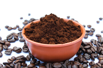 Roasted Coffee beans powder in a bowl 