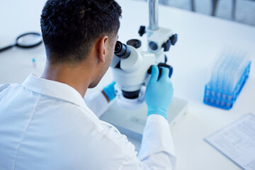 Science, exam and man with microscope, notes and medical research in laboratory. Vaccine...