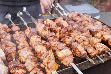 BBQ grill is used to grill pork skewers over charcoal