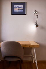 Close up of work place with chair and lamp