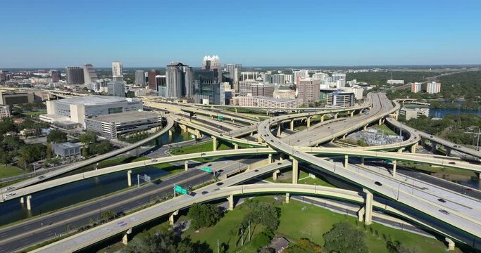 Orlando, Florida. Aerial view of American highway junction with fast driving vehicles. View from above of USA transportation infrastructure