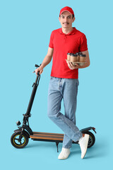 Male courier with coffee cups and kick scooter on blue background