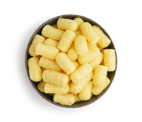 Bowl with tasty corn sticks on white background