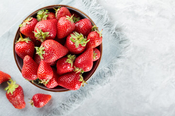 Fresh Ripe Strawberries in Bowl on Gray Napkin, Copy Space