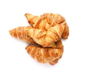 Many tasty croissants on white background