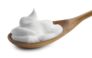 Wooden spoon with sour cream isolated on white