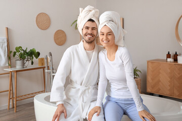 Young loving couple after shower in bathroom