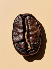 Naklejka premium Close-Up of a Single Roasted Coffee Bean
