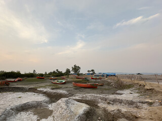 Colourful boats at low tide, Chittagong, Bangladesh