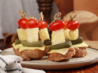 Food BBQ Grilled Pork Cheese Skewers and Pineapple Tomatoes