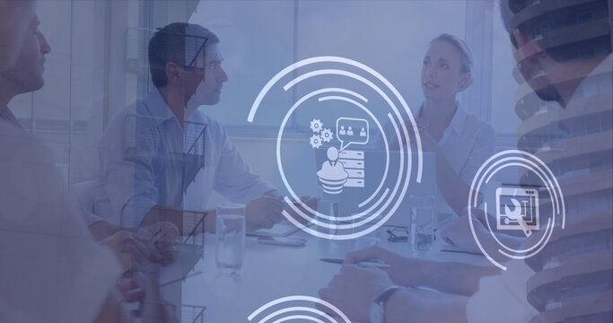 Caucasian family discussing digital graphics in office - Powered by Adobe