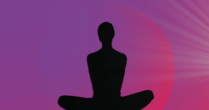 Image of light spot over silhouette of a woman in yoga pose against purple gradient background
