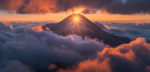 A majestic mountain peak emerging through a blanket of thick clouds, with the sun setting behind it, casting a warm, orange glow 32k, full ultra hd, high resolution - Powered by Adobe