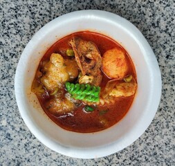Spicy seblak with various toppings in a bowl Seblak is a typical Indonesian food.spicy seblak 