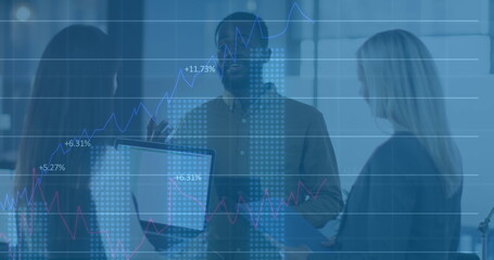 Image of multiple graphs and changing numbers, diverse coworkers talking in office