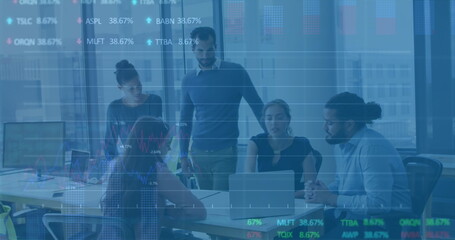 Image of multiple graphs and trading boards, diverse coworkers discussing reports on laptop