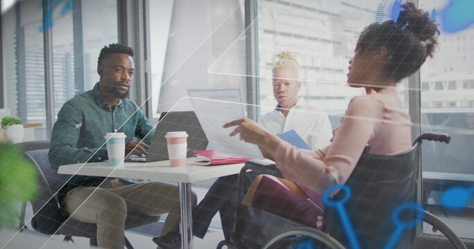 Image of computer language, globe, diverse coworkers with coffee discussing reports in office