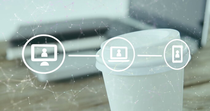 Image of flowchart of icons and connected dots over coffee cup and laptop on table - Powered by Adobe